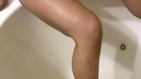 sleazy black legal age teenager ladyboy Swings Her enormous Shemeat In The Bathtub
