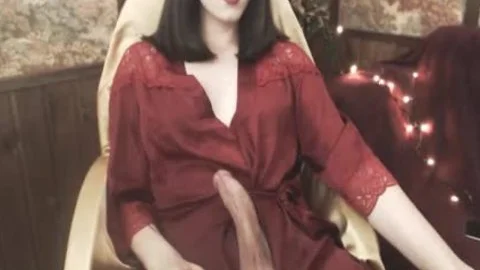filthy ladyboy In Red suit Strokes & Cums